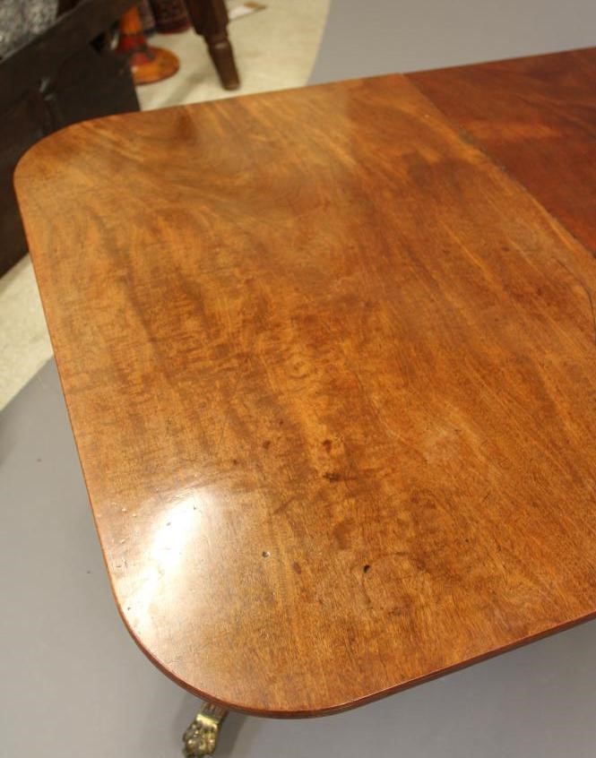 A VICTORIAN MAHOGANY EXTENDING TWIN PEDESTAL DINING TABLE Image