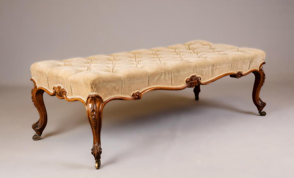 A LATE VICTORIAN LARGE WALNUT STOOL of oblong form Image
