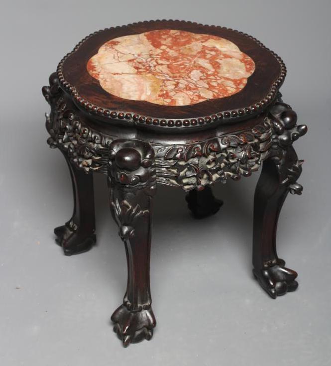 A CHINESE PADOUK WOOD JARDINIERE STAND Image