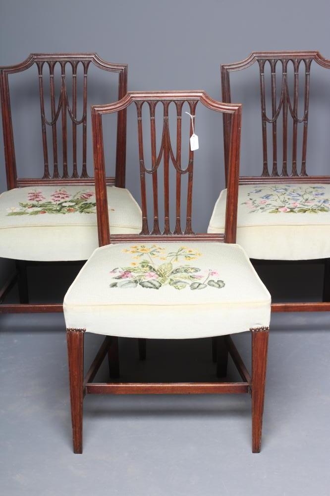 A SET OF THREE GEORGIAN LOZENGE BACK SIDE CHAIRS Image