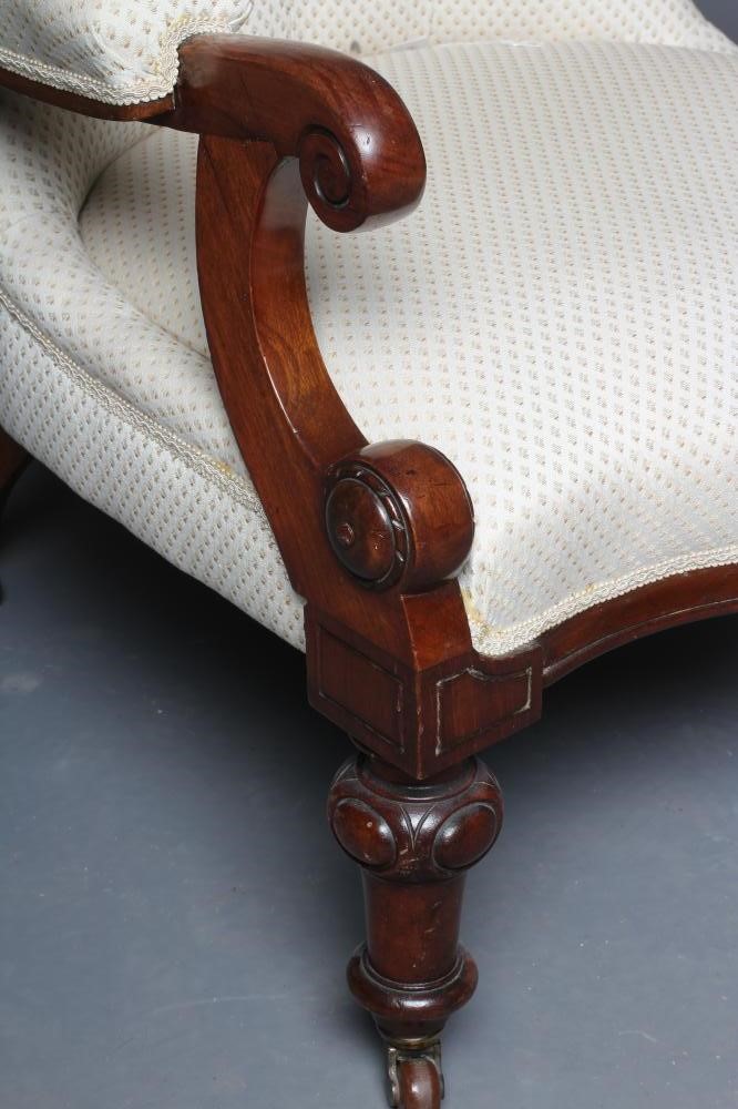 A VICTORIAN MAHOGANY ARMCHAIR button upholstered in an ivory weave Image