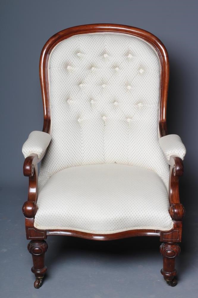 A VICTORIAN MAHOGANY ARMCHAIR button upholstered in an ivory weave Image