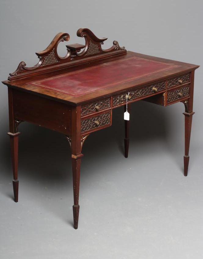 A LATE VICTORIAN MAHOGANY WRITING DESK Image