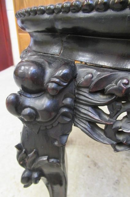 A CHINESE PADOUK WOOD JARDINIERE STAND Image