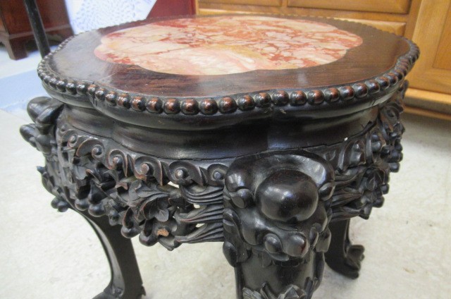 A CHINESE PADOUK WOOD JARDINIERE STAND Image