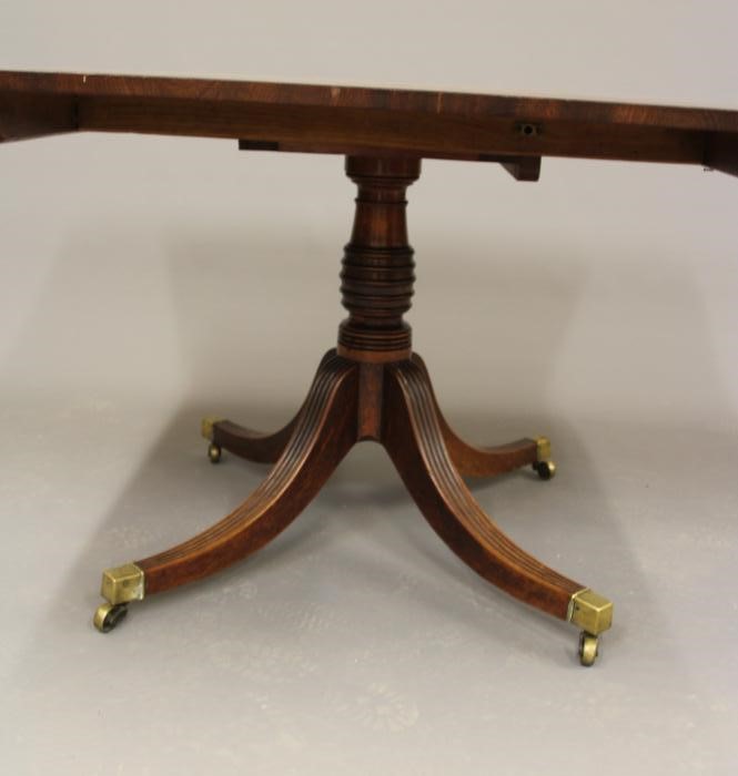 A MAHOGANY BREAKFAST TABLE Image