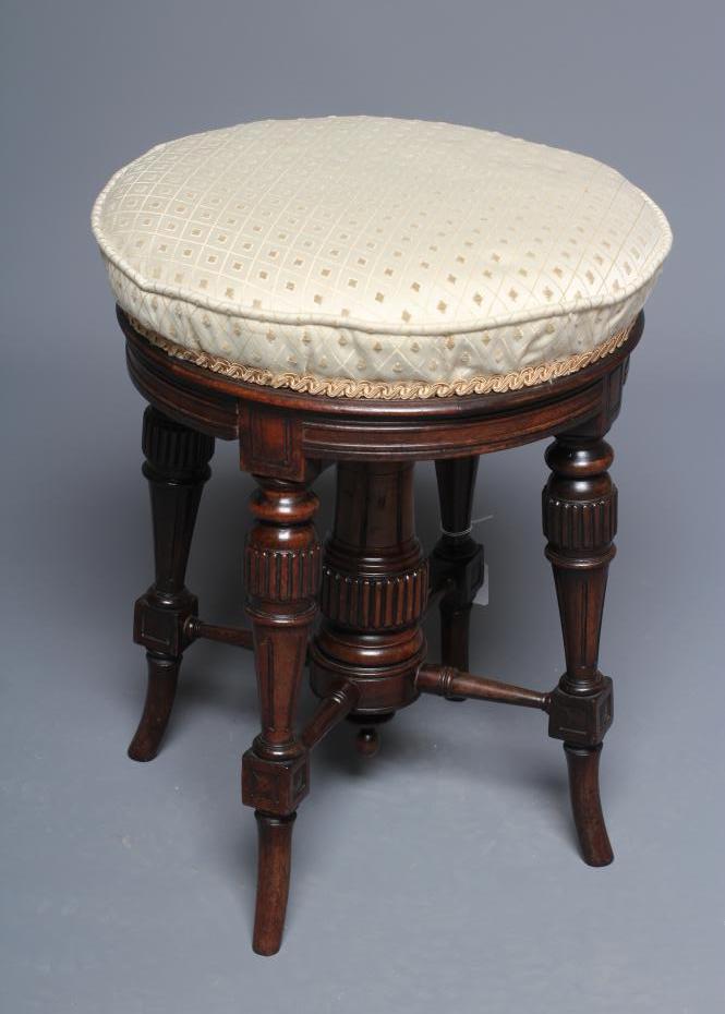 A REGENCY ROSEWOOD PIANO STOOL Image