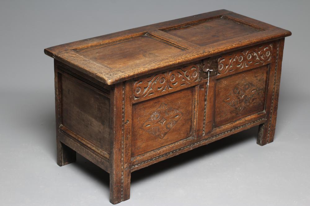 A JOINED OAK PANELLED COFFER Image
