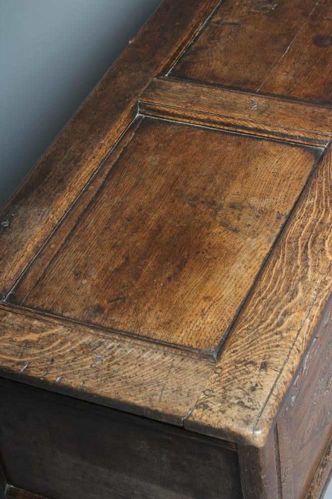A JOINED OAK PANELLED COFFER Image