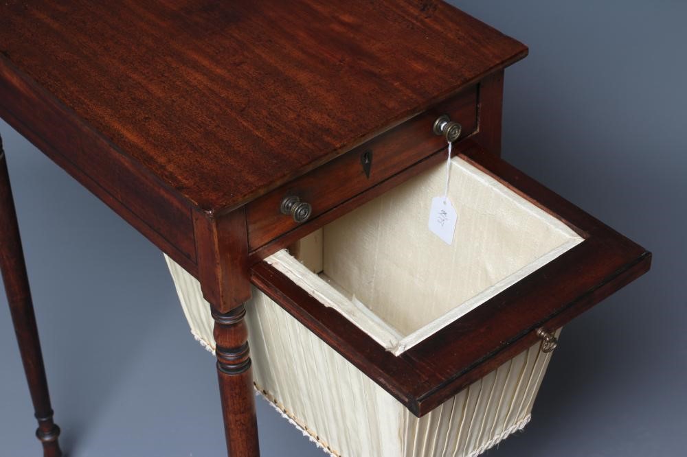 A REGENCY MAHOGANY WORK TABLE of oblong form with ebony stringing Image