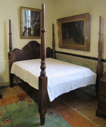 A JAMAICAN HARDWOOD "WATERFALL" FOUR POSTER BED Image