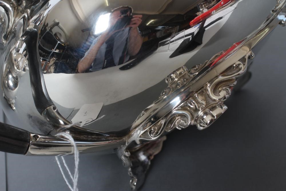 AN EDWARDIAN SILVER FOUR PIECE TEA AND COFFEE SERVICE Image