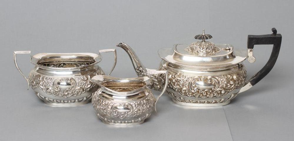 AN EDWARDIAN SILVER THREE PIECE TEA SERVICE Image