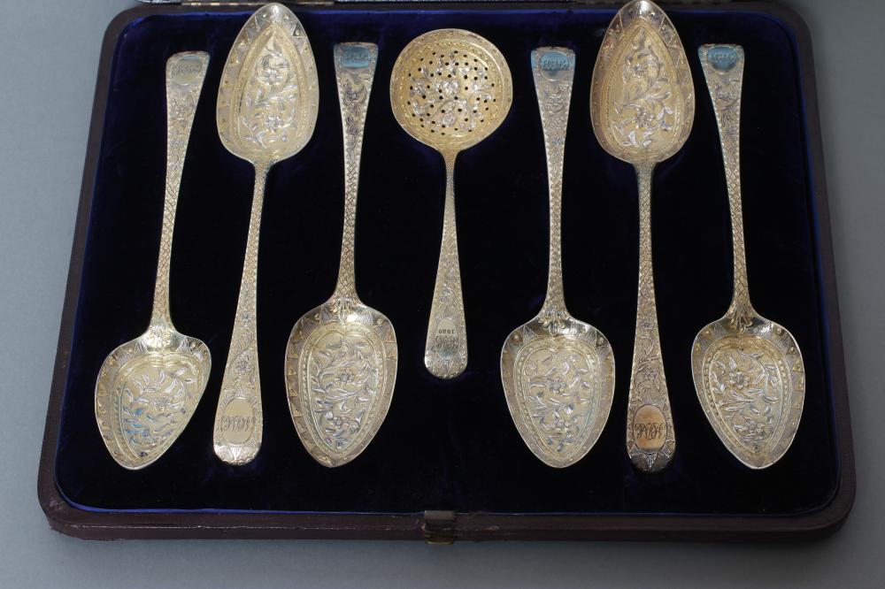 A COMPOSITE GEORGE III SILVER FRUIT SERVING SET Image