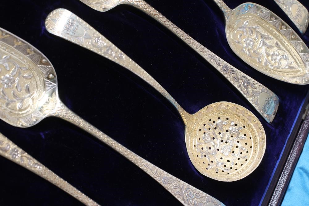A COMPOSITE GEORGE III SILVER FRUIT SERVING SET Image