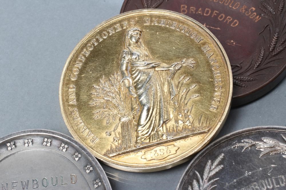 A LATE VICTORIAN 9CT GOLD "BAKERS' AND CONFECTIONERS' EXHIBITION (MANCHESTER)" MEDAL Image