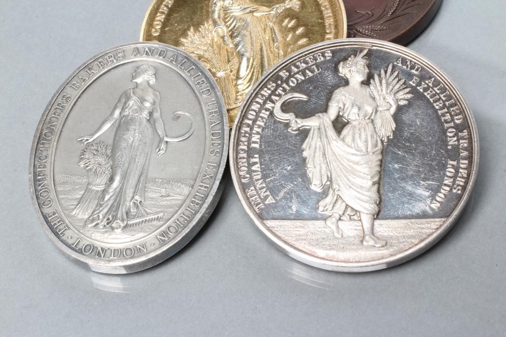 A LATE VICTORIAN 9CT GOLD "BAKERS' AND CONFECTIONERS' EXHIBITION (MANCHESTER)" MEDAL Image