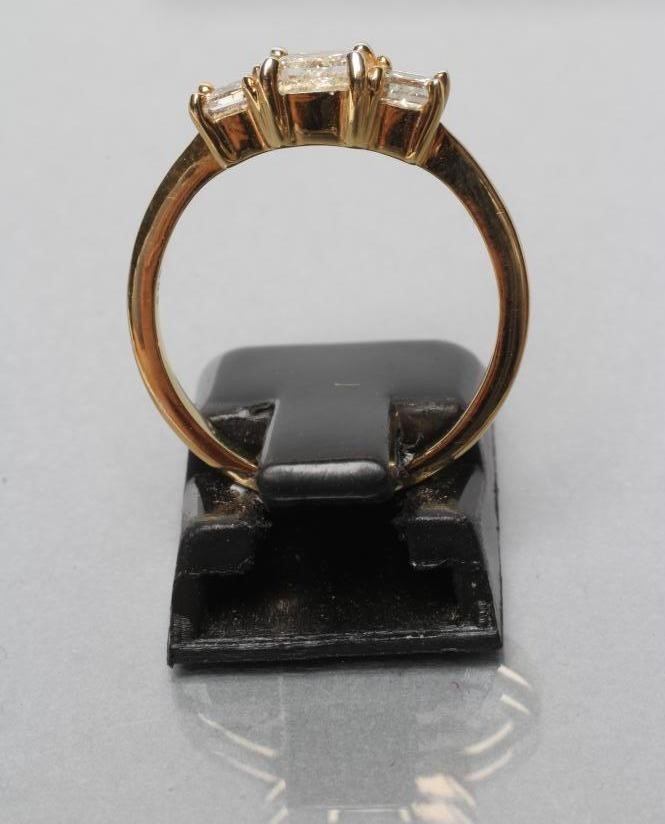 A THREE STONE DIAMOND RING Image