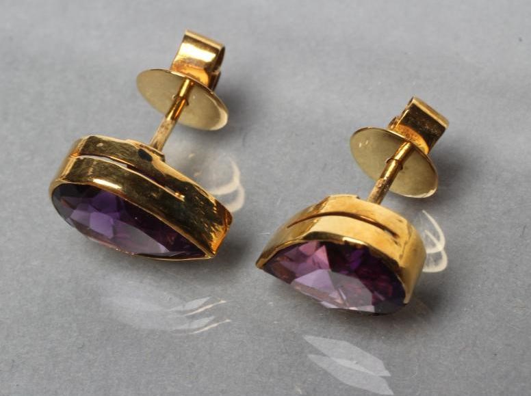 A PAIR OF AMETHYST EAR STUDS Image
