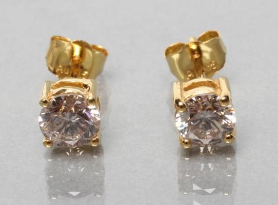 A PAIR OF DIAMOND SOLITAIRE EAR STUDS Image
