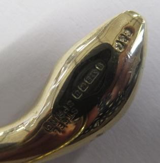 A VICTORIAN STYLE 9CT GOLD SERPENT BANGLE Image