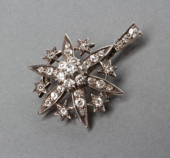 AN EDWARDIAN DIAMOND FLOWER PENDANT Image