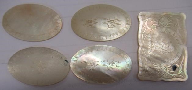 A COLLECTION OF CHINESE MOTHER OF PEARL GAMING COUNTERS including six oblong with a coat of arms and Image
