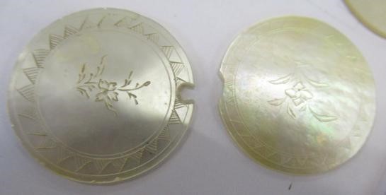 A COLLECTION OF CHINESE MOTHER OF PEARL GAMING COUNTERS including six oblong with a coat of arms and Image
