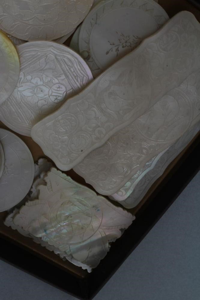 A COLLECTION OF CHINESE MOTHER OF PEARL GAMING COUNTERS including six oblong with a coat of arms and Image