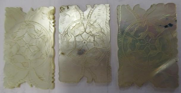 A COLLECTION OF CHINESE MOTHER OF PEARL GAMING COUNTERS including six oblong with a coat of arms and Image