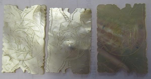 A COLLECTION OF CHINESE MOTHER OF PEARL GAMING COUNTERS including six oblong with a coat of arms and Image