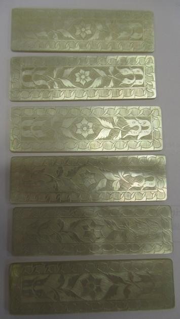 A COLLECTION OF CHINESE MOTHER OF PEARL GAMING COUNTERS including six oblong with a coat of arms and Image