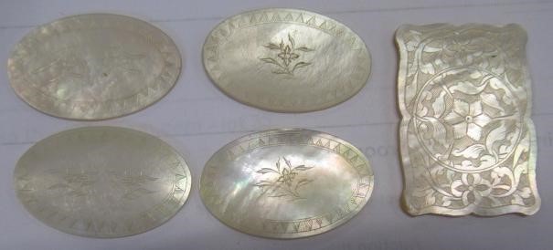 A COLLECTION OF CHINESE MOTHER OF PEARL GAMING COUNTERS including six oblong with a coat of arms and Image