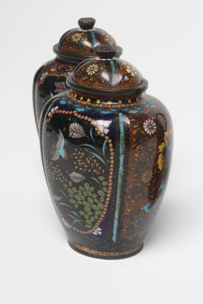 A PAIR OF CHINESE CLOISONNE ENAMEL VASES AND COVERS of lobed oval form Image