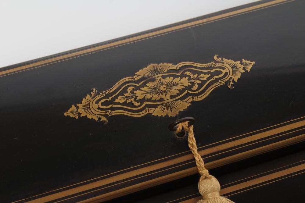 AN EBONY AND BRASS INLAID WRITING BOX Image