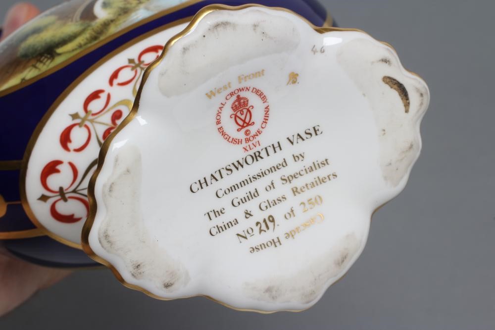 A ROYAL CROWN DERBY CHINA "CHATSWORTH VASE" painted by G. Boulton with a view of the West Front and Image