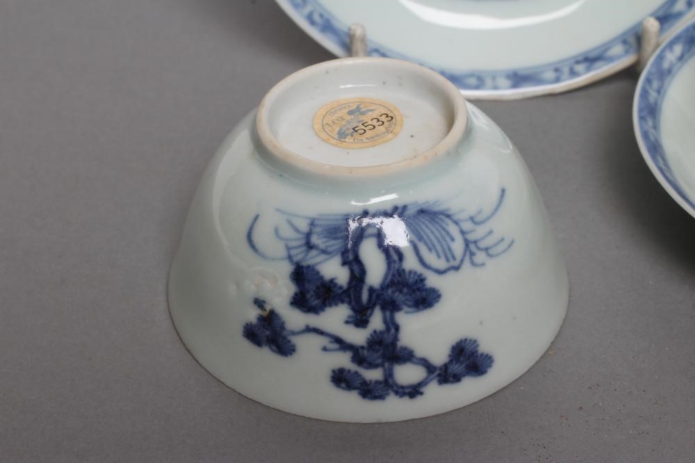 TWO NANKING CARGO PORCELAIN TEA BOWLS AND SAUCERS Image