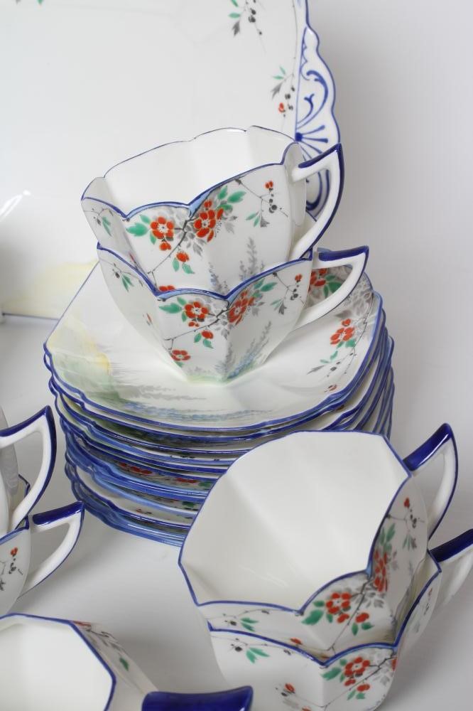 AN ART DECO SHELLEY CHINA QUEEN ANN TEA SERVICE printed and painted with the Lupin pattern Image