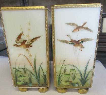 A PAIR OF OPALINE GLASS VASES Image