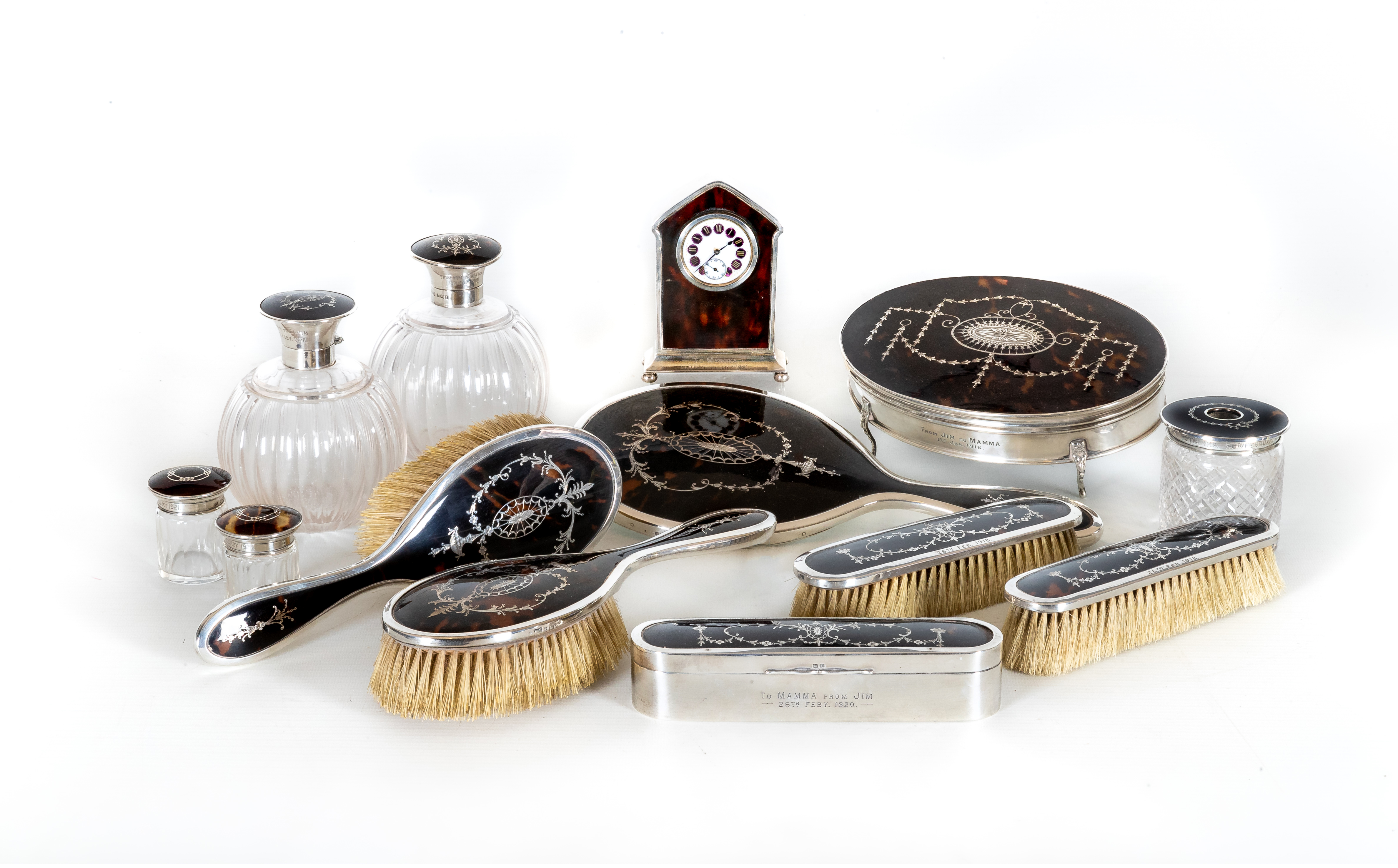 AN EXTENSIVE COMPOSITE TORTOISESHELL PIQUE WORK SILVER DRESSING TABLE SET Image