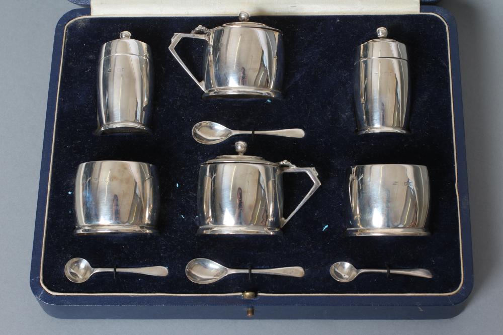 AN ART DECO SILVER SIX PIECE CRUET Image