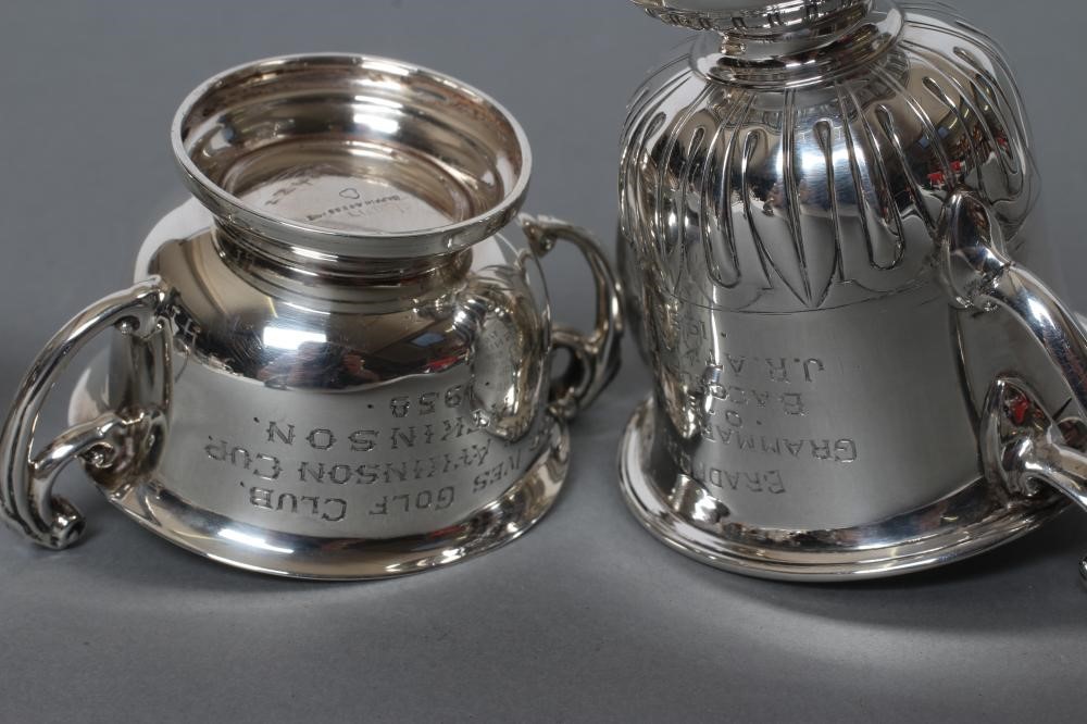 A SMALL TWO HANDLED SILVER TROPHY AND COVER Image