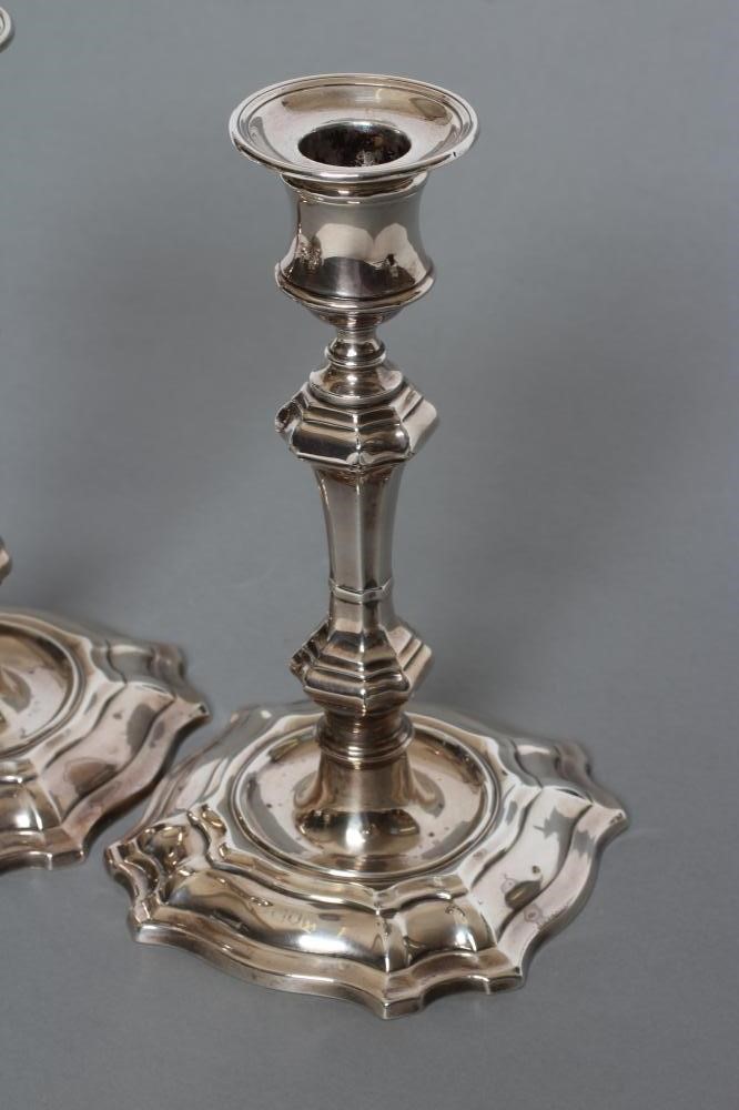 A PAIR OF GEORGE II STYLE SILVER CANDLESTICKS Image