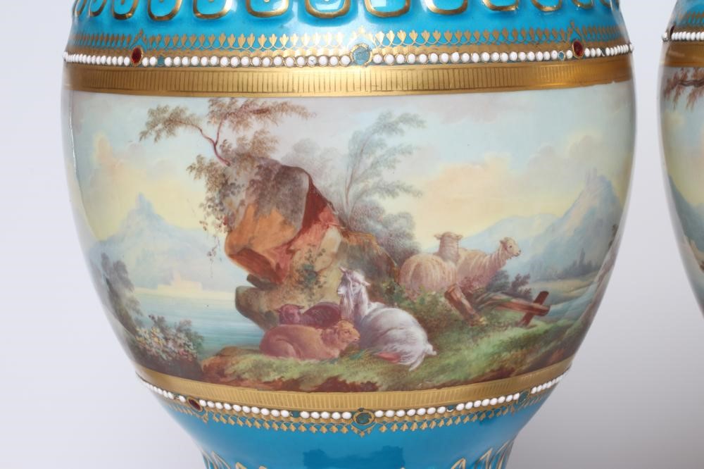 A PAIR OF FRENCH PORCELAIN GARNITURE VASES AND COVERS Image