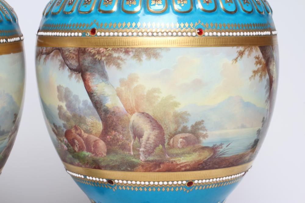A PAIR OF FRENCH PORCELAIN GARNITURE VASES AND COVERS Image