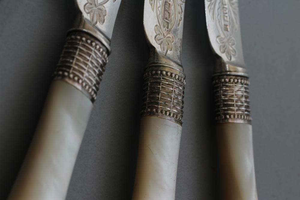 A SET OF SIX VICTORIAN SILVER DESSERT KNIVES Image