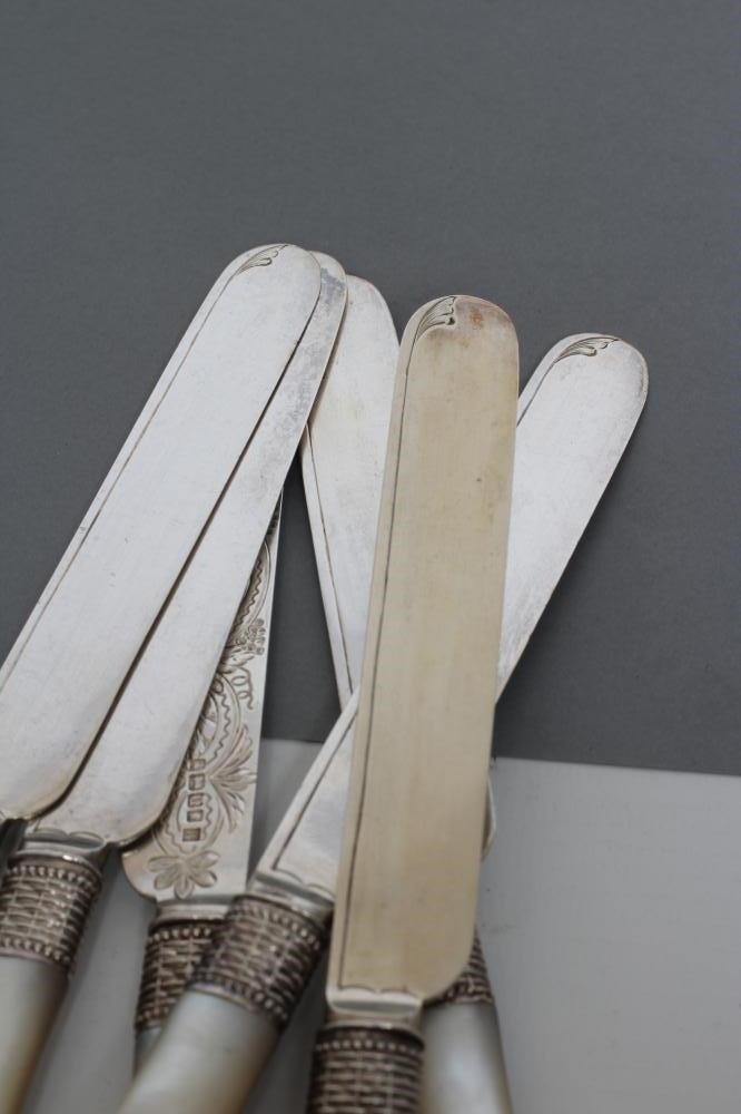 A SET OF SIX VICTORIAN SILVER DESSERT KNIVES Image