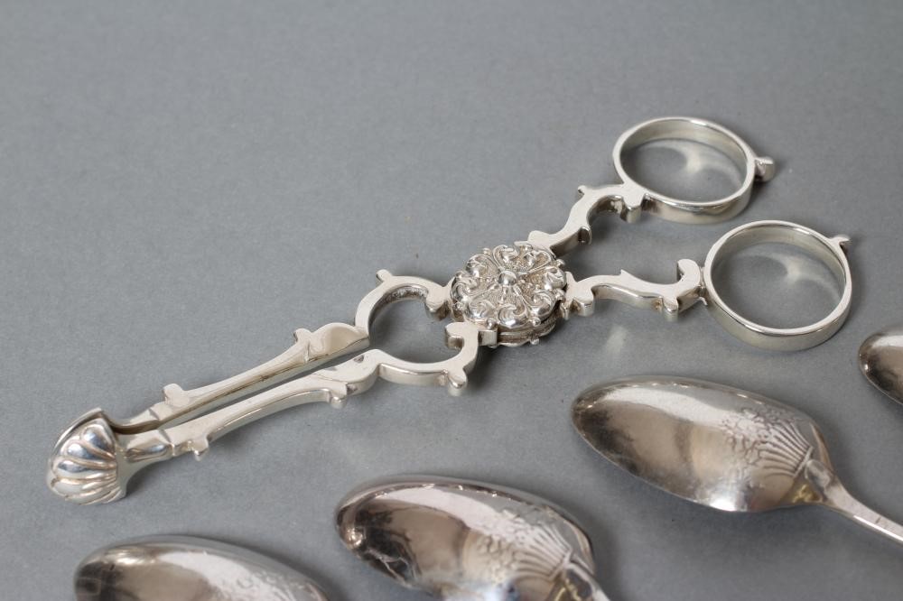 A SET OF FOUR GEORGE II SILVER PICTURE BACK TEASPOONS Image