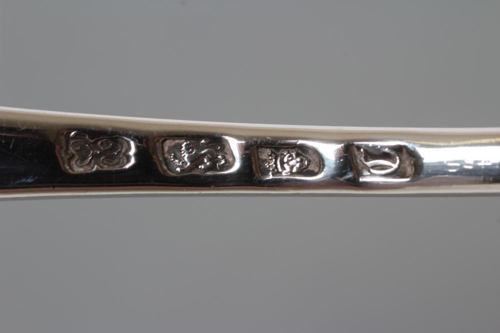 A GEORGE III SILVER SOUP LADLE Image