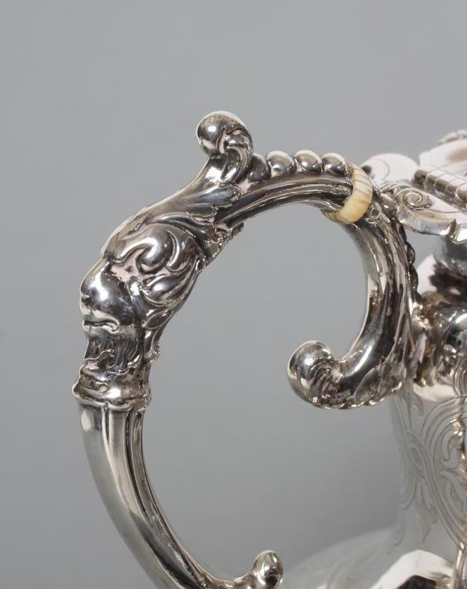 AN EARLY VICTORIAN SILVER FOUR PIECE TEA AND COFFEE SERVICE Image